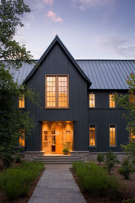 dark grey house with black metal roof|gray exterior with black trim.